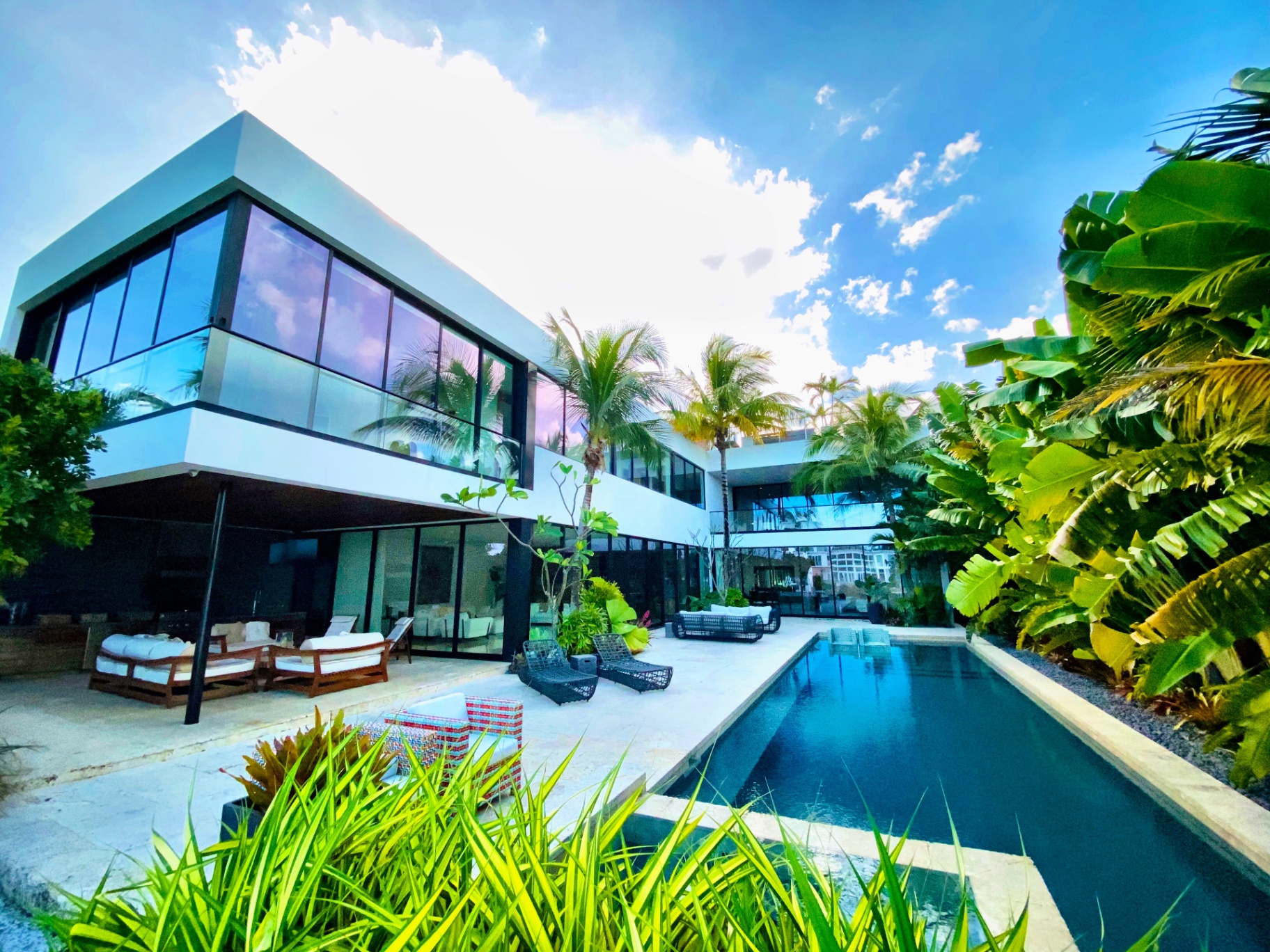Miami Beach contemporary glass villa inspected by Home Pro Miami