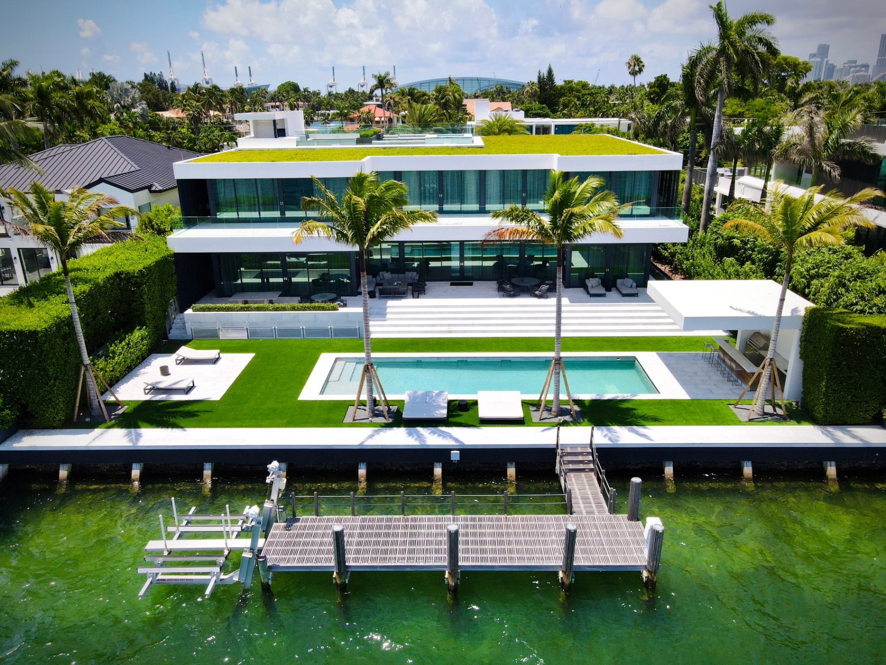Miami Beach luxury waterfront estate with pool and private dock inspected by Home Pro Miami